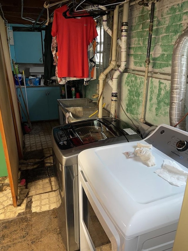 laundry area featuring separate washer and dryer