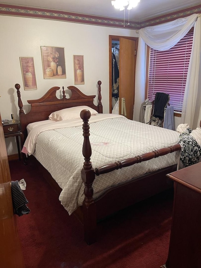 carpeted bedroom featuring ornamental molding