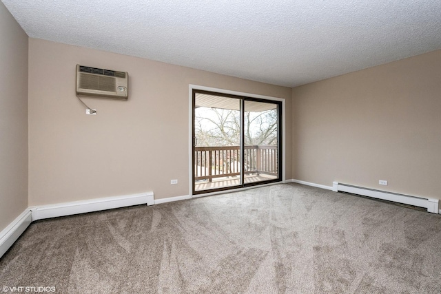 empty room featuring a textured ceiling, light carpet, a wall unit AC, and a baseboard radiator