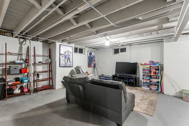 living room featuring concrete flooring