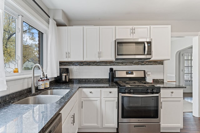 kitchen with white cabinetry and stainless steel appliances