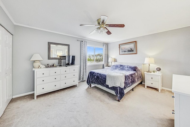 bedroom featuring a closet, ceiling fan, and carpet floors