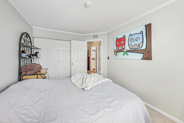 carpeted bedroom with a closet and crown molding