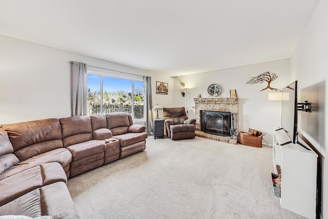 carpeted living room featuring a brick fireplace