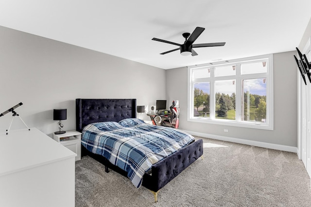 bedroom featuring ceiling fan and carpet floors