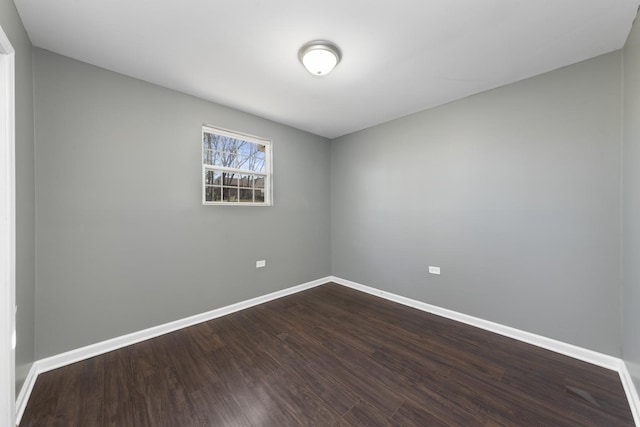 empty room with hardwood / wood-style floors