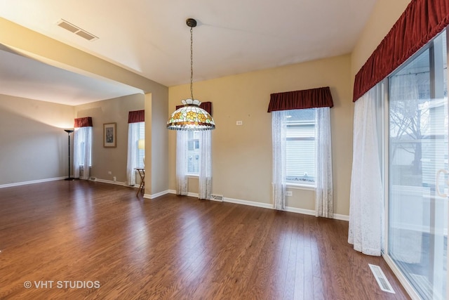 unfurnished room featuring dark hardwood / wood-style floors