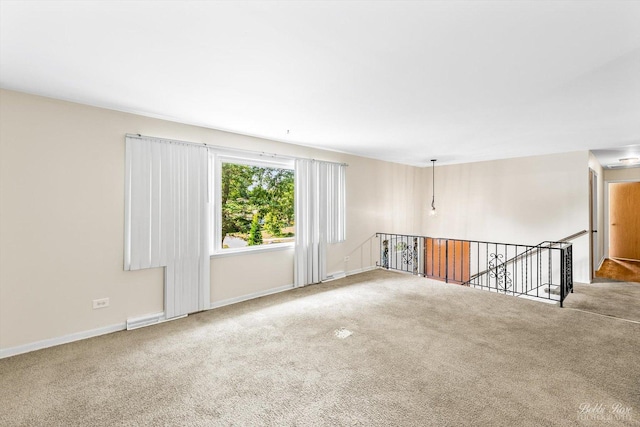 empty room featuring carpet flooring