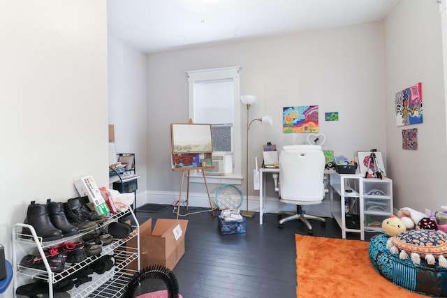 home office with dark wood-type flooring