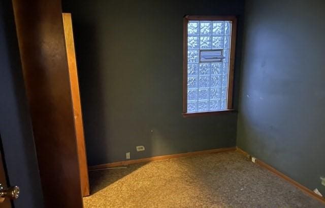 empty room with carpet flooring