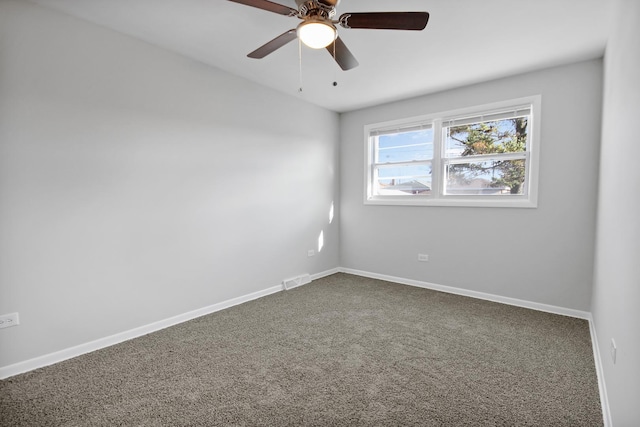 carpeted empty room with ceiling fan