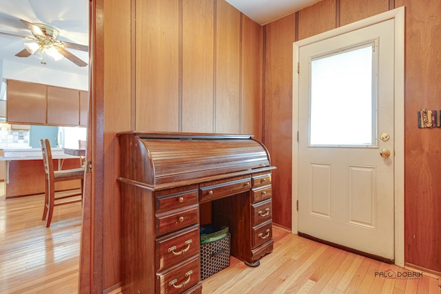 office space featuring ceiling fan and light wood-type flooring