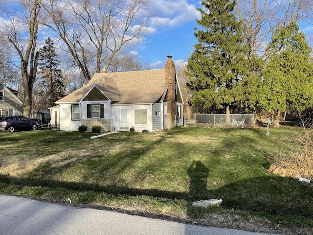 view of home's exterior with a yard