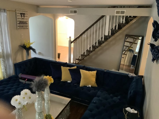 15821 Whipple Ave, Markham, IL 60428 - living room with stairway, arched walkways, and wood finished floors