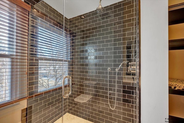 bathroom featuring an enclosed shower