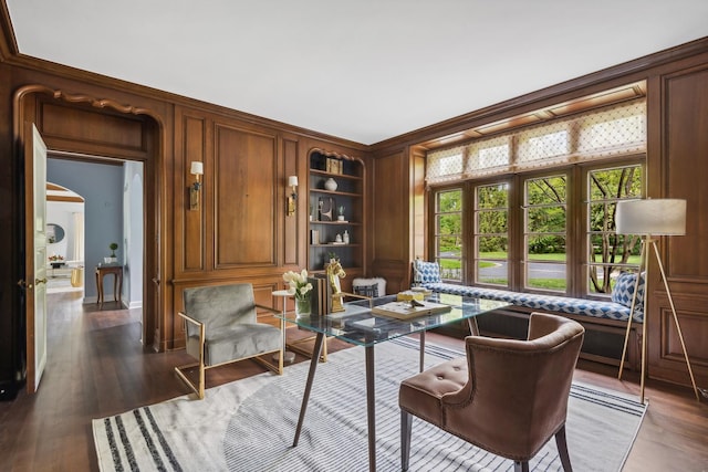 office area featuring dark hardwood / wood-style flooring and built in features