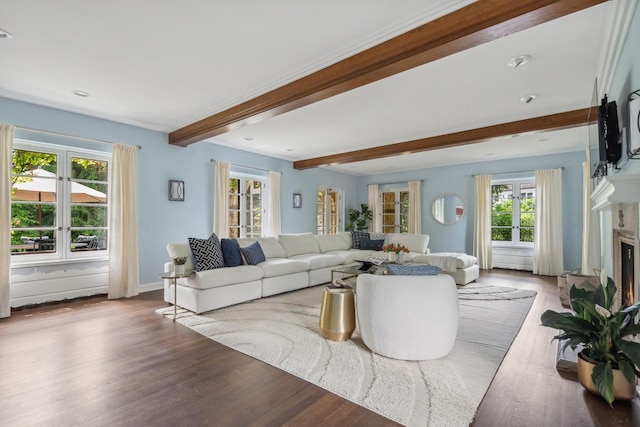 living room with a high end fireplace, beam ceiling, and wood-type flooring