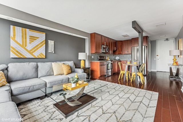 living area with dark wood-style floors