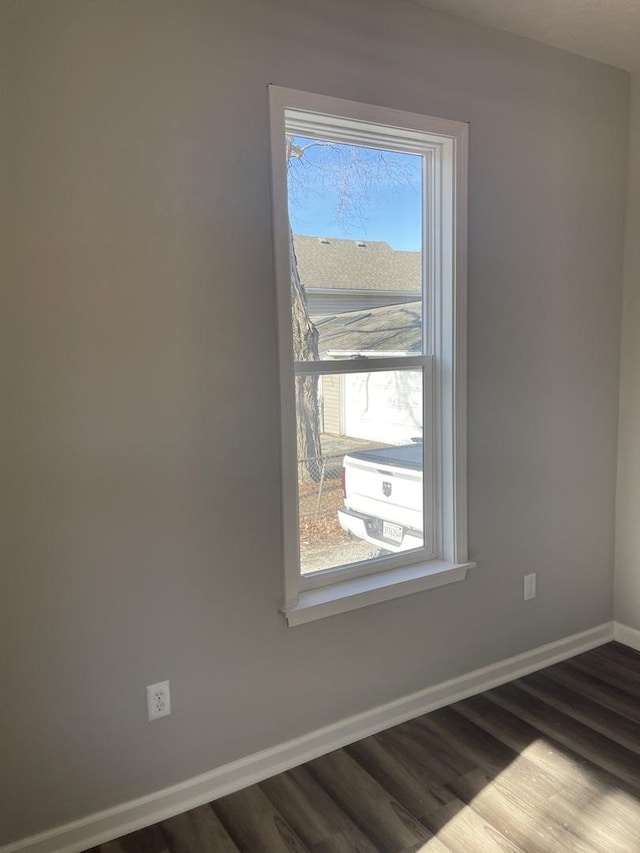 unfurnished room featuring hardwood / wood-style floors