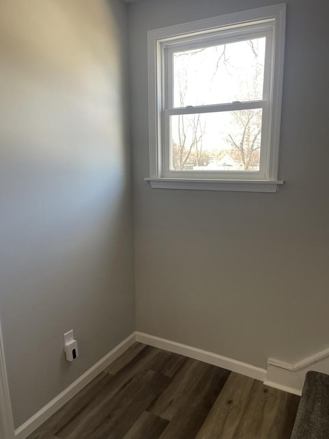 unfurnished room featuring dark hardwood / wood-style floors