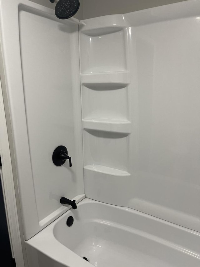 bathroom featuring shower / washtub combination