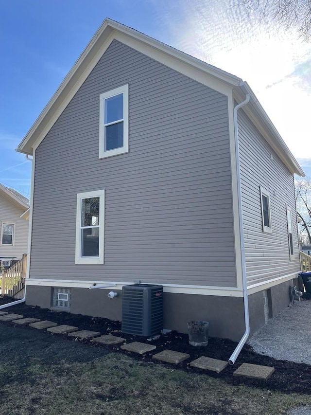 view of property exterior featuring central AC unit