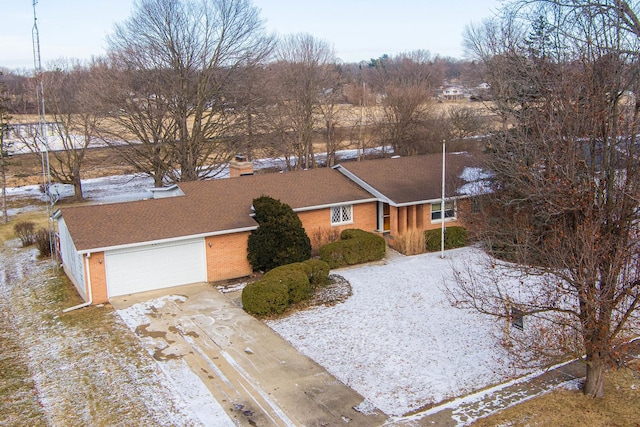 single story home featuring a garage