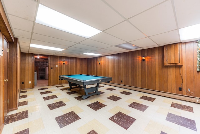 game room featuring pool table, wood walls, and a paneled ceiling