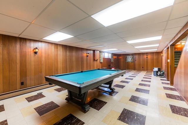 game room with wooden walls, billiards, and a drop ceiling