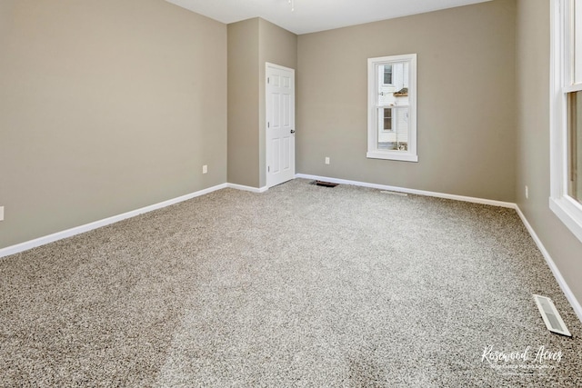 view of carpeted spare room