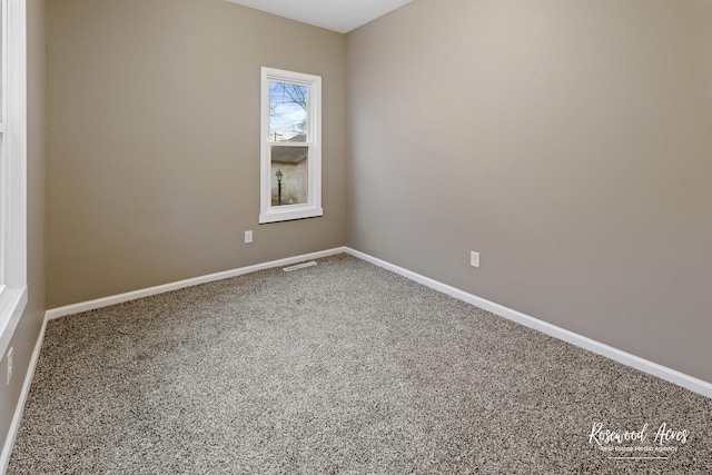 view of carpeted spare room