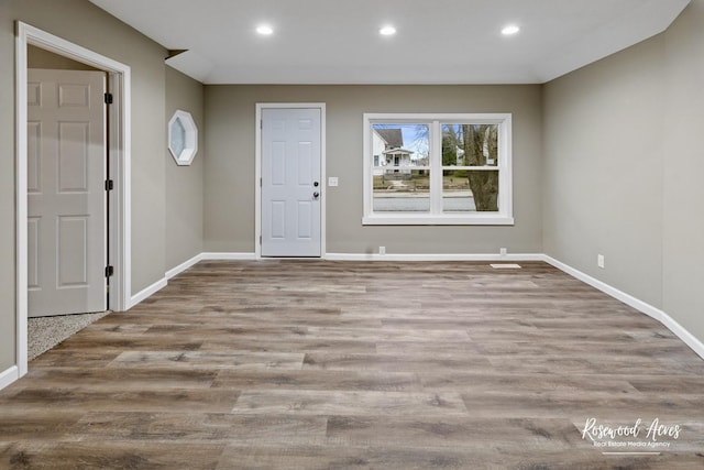 entryway with light hardwood / wood-style floors