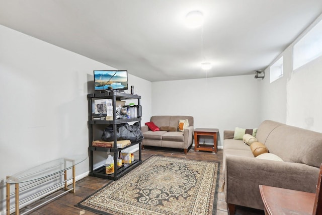 living room with dark hardwood / wood-style flooring