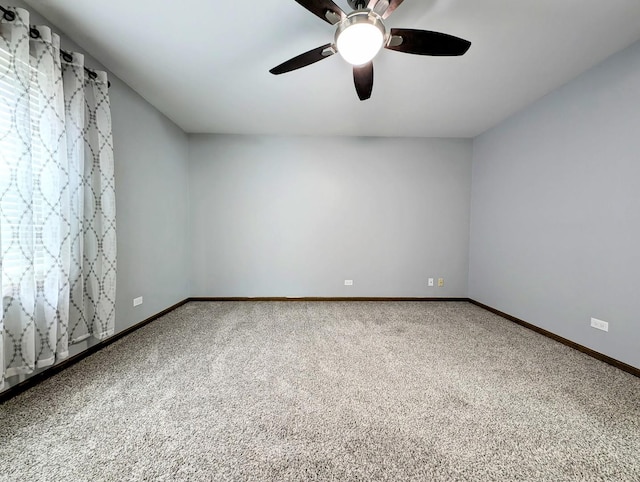 empty room with carpet floors and ceiling fan