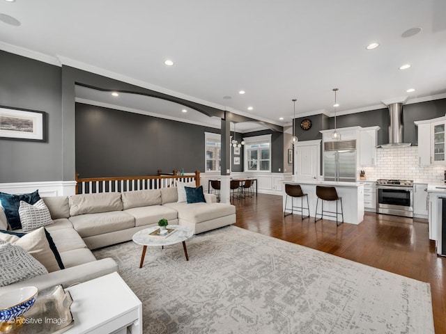 living room featuring crown molding and dark wood-type flooring