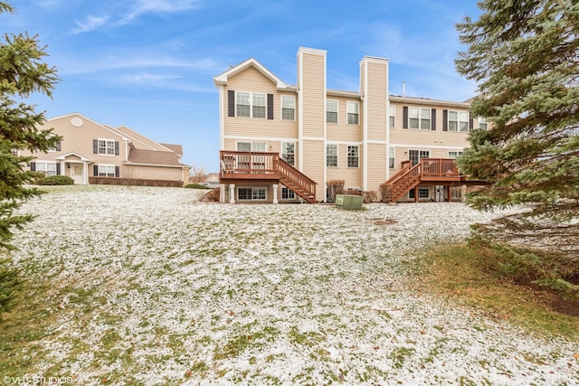 rear view of property with a deck