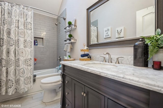 full bathroom featuring shower / bath combination with curtain, lofted ceiling, vanity, and toilet