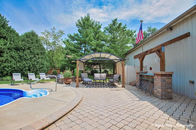 35161 N Indian Trl, Ingleside, IL 60041 - view of swimming pool featuring outdoor dry bar, a fenced in pool, a gazebo, outdoor lounge area, and a patio