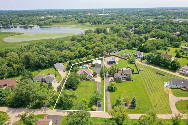 35161 N Indian Trl, Ingleside, IL 60041 - drone / aerial view with a wooded view, a water view, and a residential view