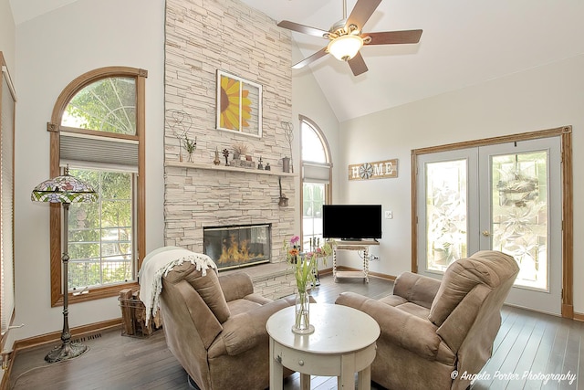 35161 N Indian Trl, Ingleside, IL 60041 - living area featuring a stone fireplace, french doors, wood-type flooring, and high vaulted ceiling