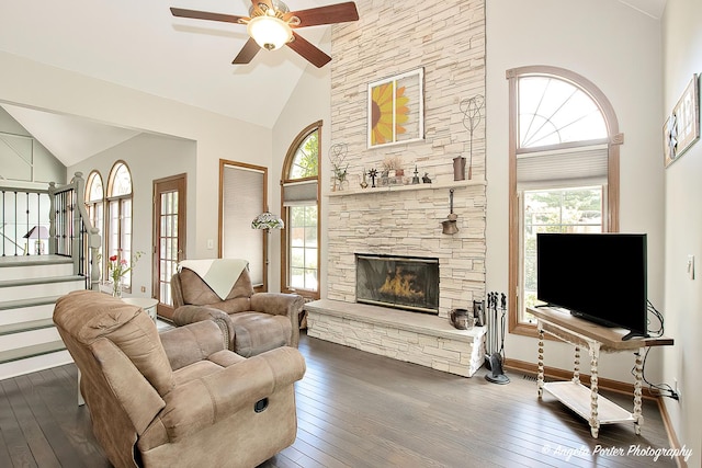 35161 N Indian Trl, Ingleside, IL 60041 - living room featuring stairway, a fireplace, high vaulted ceiling, and dark wood-style flooring
