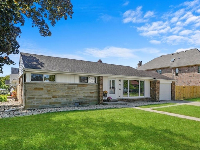 ranch-style house with a front lawn