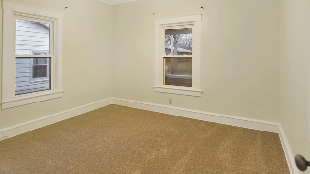 empty room with carpet flooring