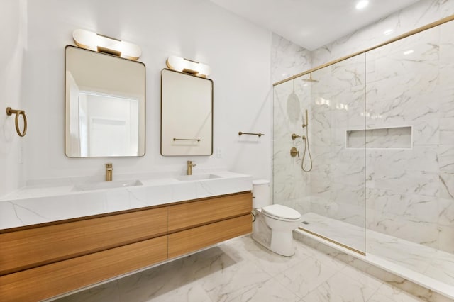 bathroom with vanity, toilet, and walk in shower