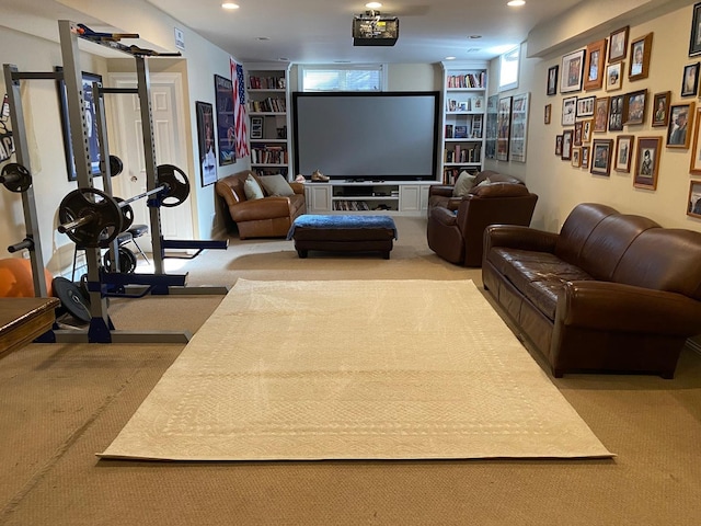 carpeted cinema room with built in features