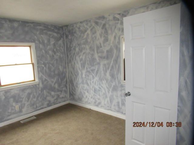 view of carpeted empty room