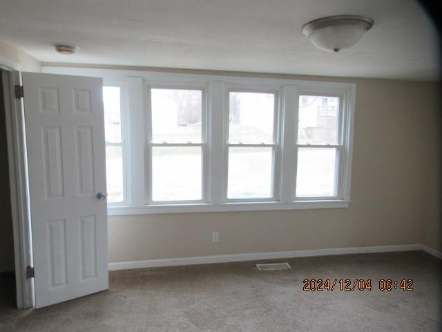 view of carpeted empty room