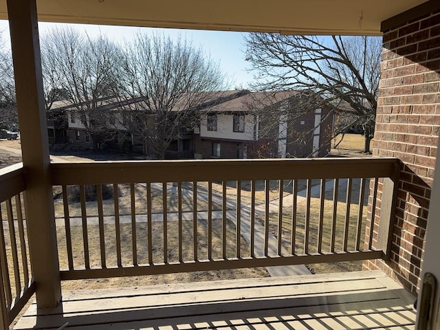 wooden deck with a residential view