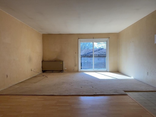 unfurnished room featuring wood finished floors