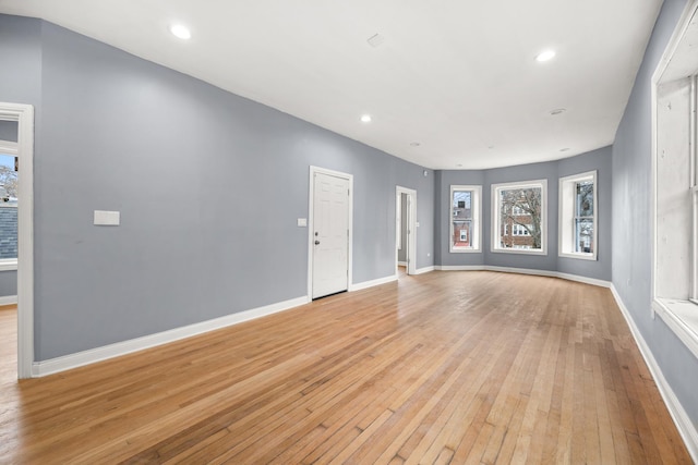 unfurnished living room featuring light hardwood / wood-style flooring